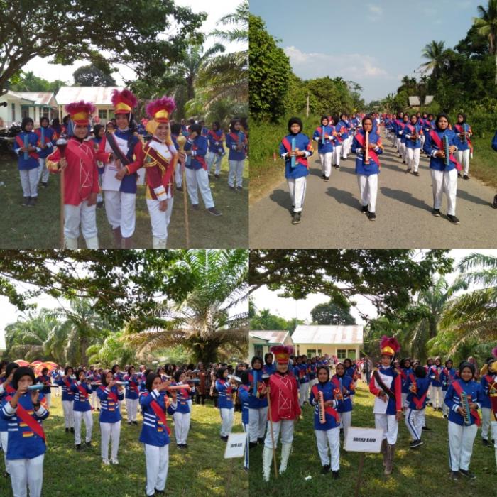Drumband GITA NADA PUKAU SELURUH  TAMU DAN MASYARAKAT DI ACARA PEMBUKAAN MTQ TINGKAT DESA 2019 DESA TANJUNG AUR